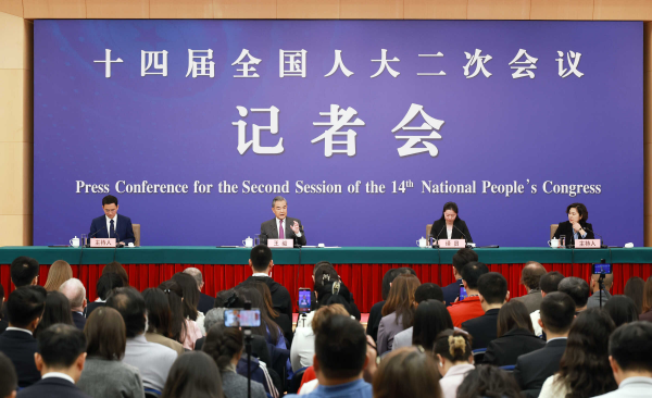 Member of the Political Bureau of the CPC Central Committee and Foreign Minister Wang Yi Meets the Press